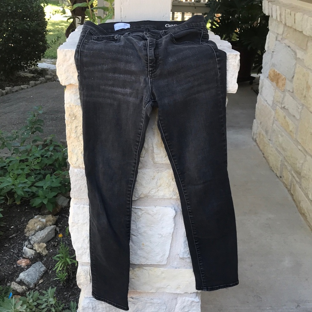 Distressed black gap slim jeans